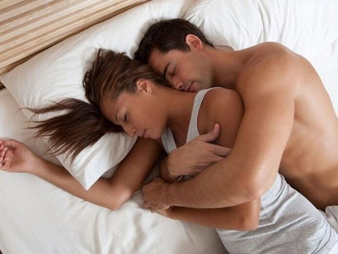 woman in bed with a man who strengthened potency